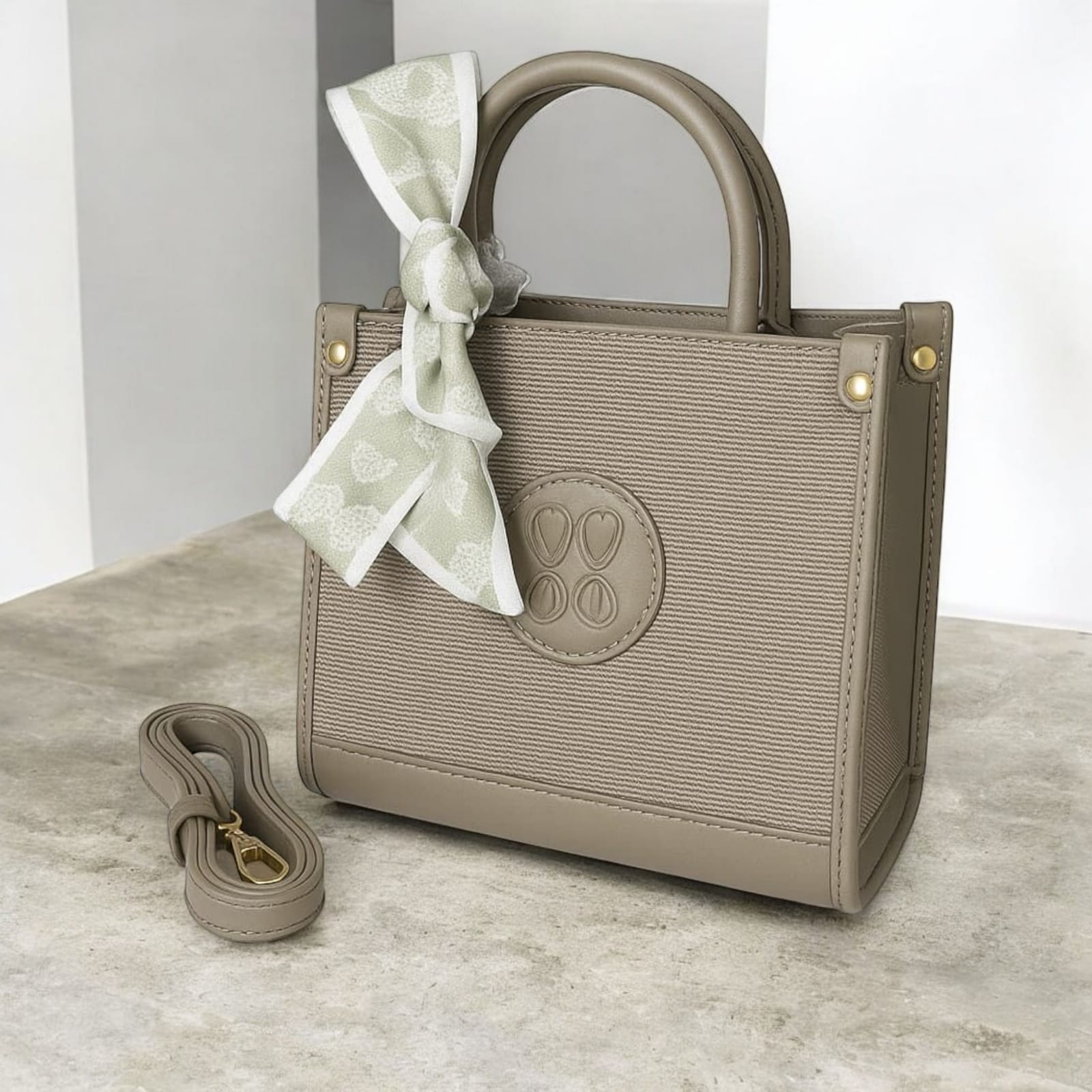 “Elegant Taupe Mini Bag – Gold Detail & Scarf Charm”