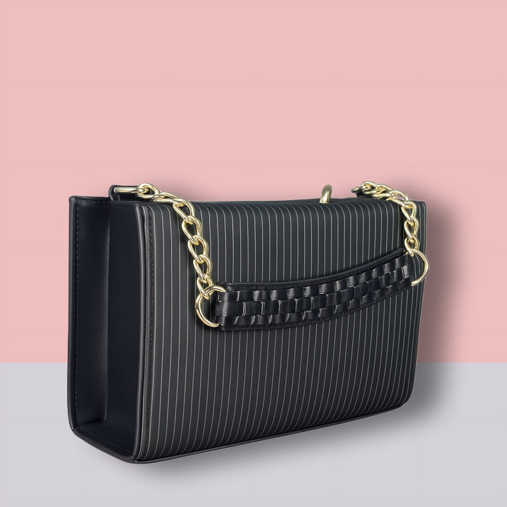 "Valentino Garavani Locò Shoulder Bag in Black with Gold-Tone Chain and Logo"