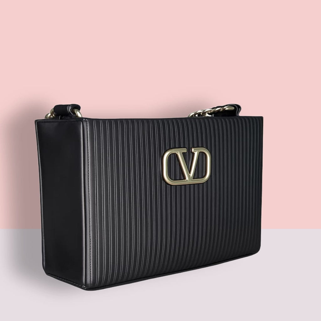 "Valentino Garavani Locò Shoulder Bag in Black with Gold-Tone Chain and Logo"