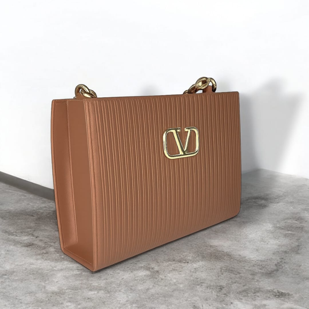 "Valentino Garavani Locò Shoulder Bag in Black with Gold-Tone Chain and Logo"