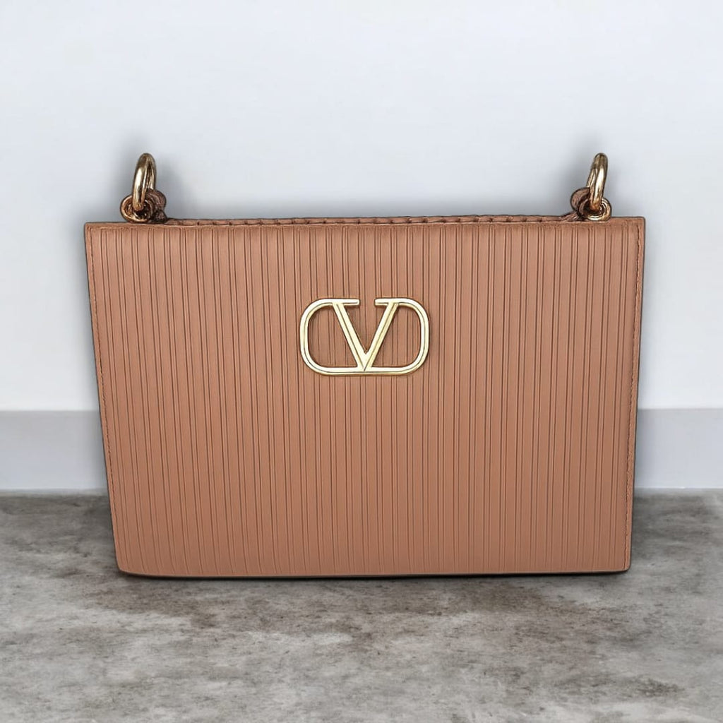 "Valentino Garavani Locò Shoulder Bag in Black with Gold-Tone Chain and Logo"