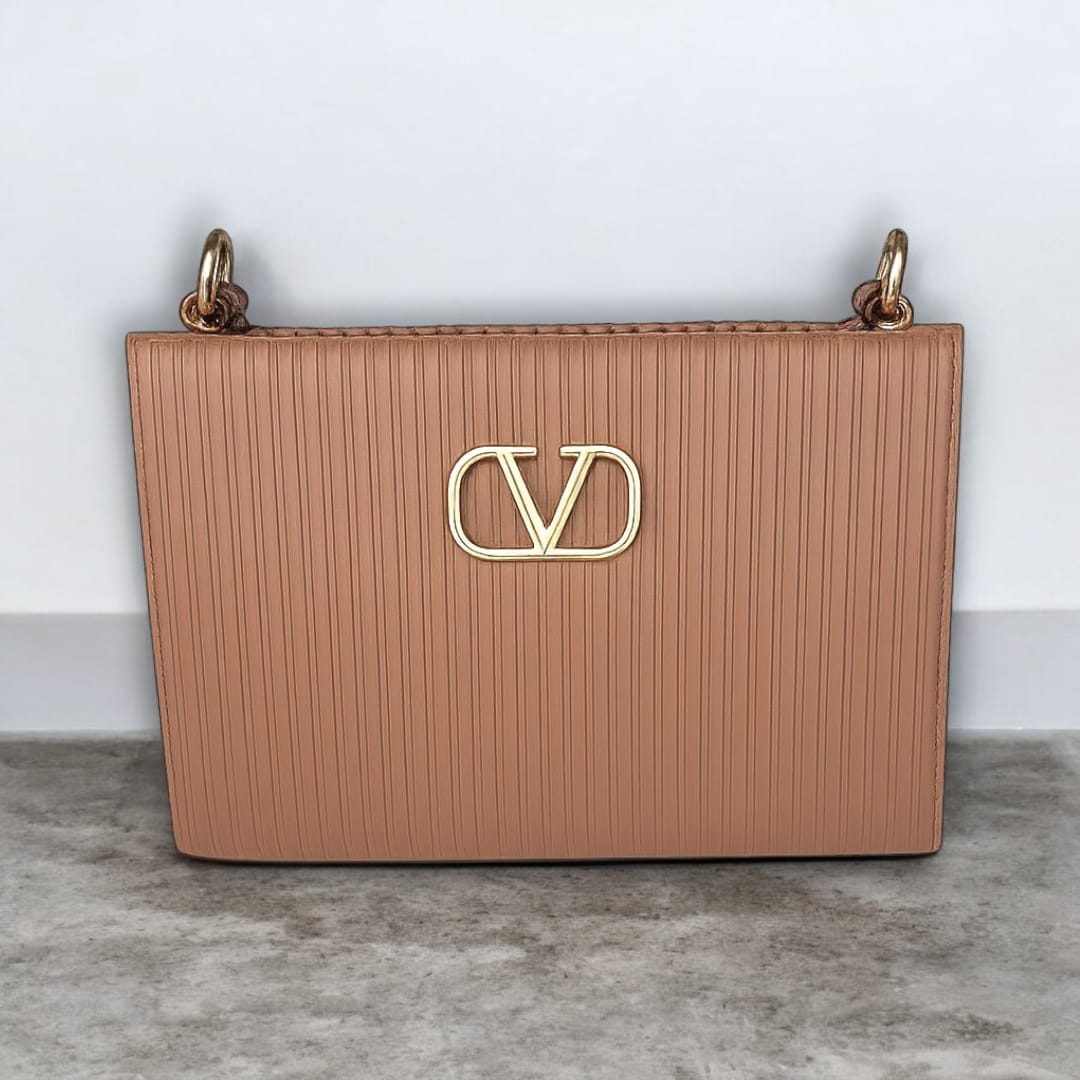 "Valentino Garavani Locò Shoulder Bag in Black with Gold-Tone Chain and Logo"