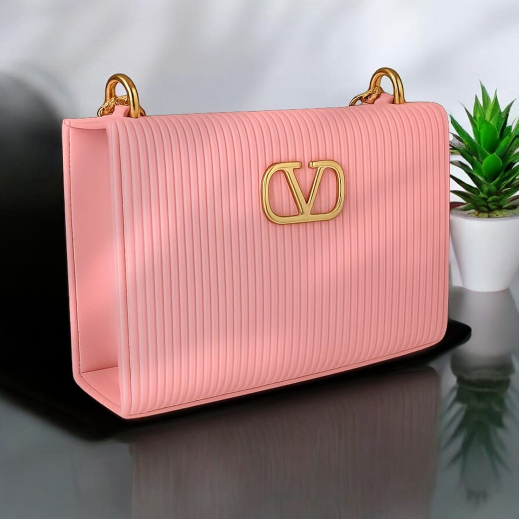 "Valentino Garavani Locò Shoulder Bag in Black with Gold-Tone Chain and Logo"