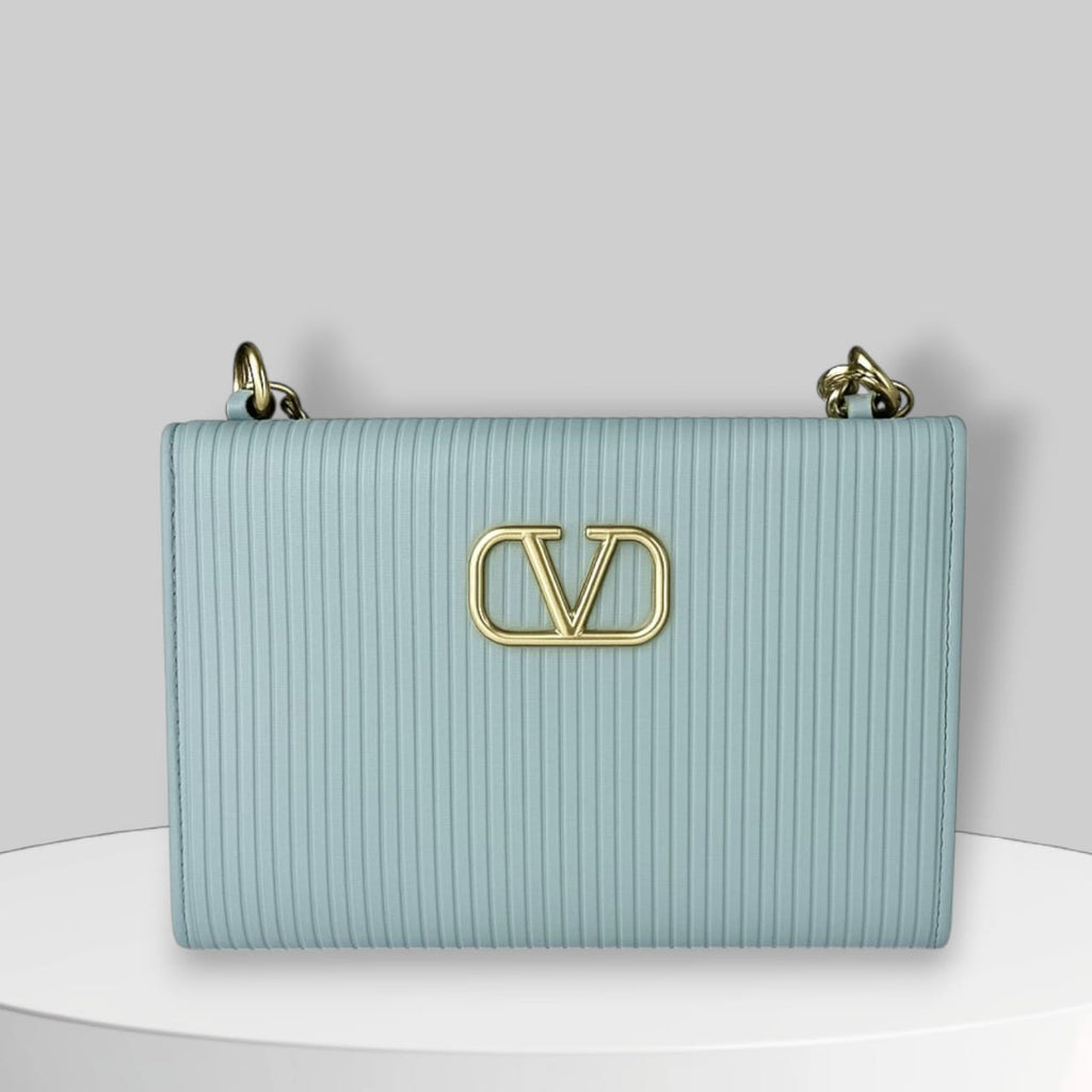 "Valentino Garavani Locò Shoulder Bag in Black with Gold-Tone Chain and Logo"