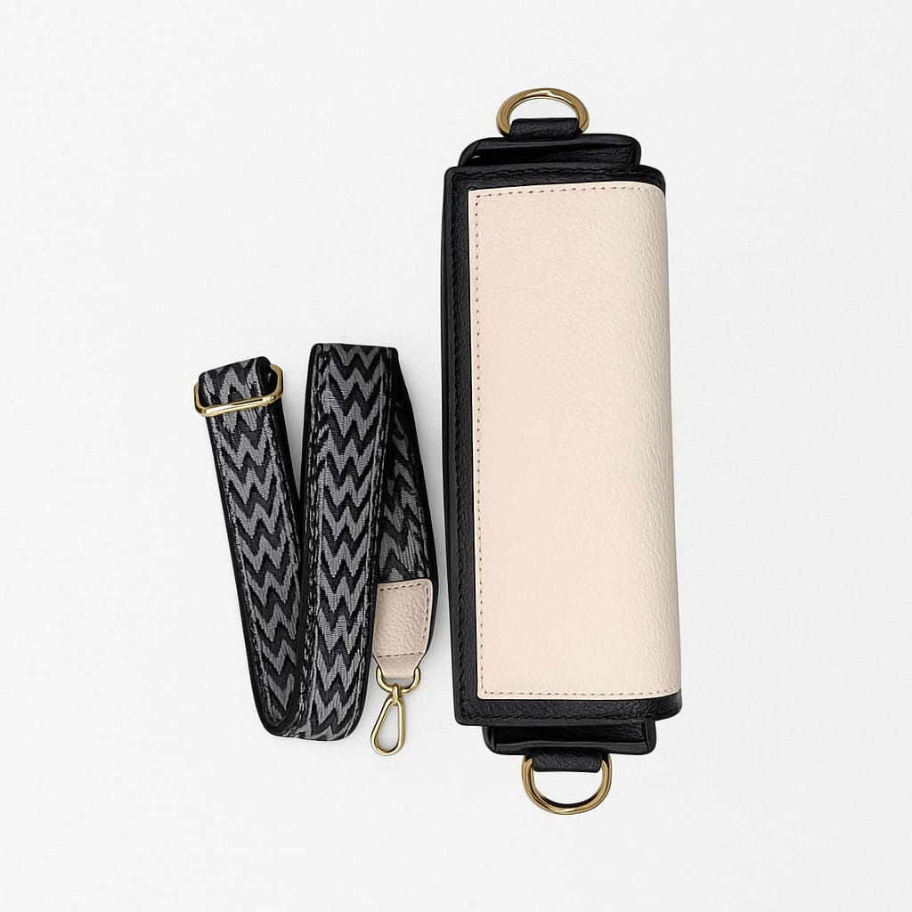 Elegant Cream & Black Crossbody Bag with Gold Ring Accent